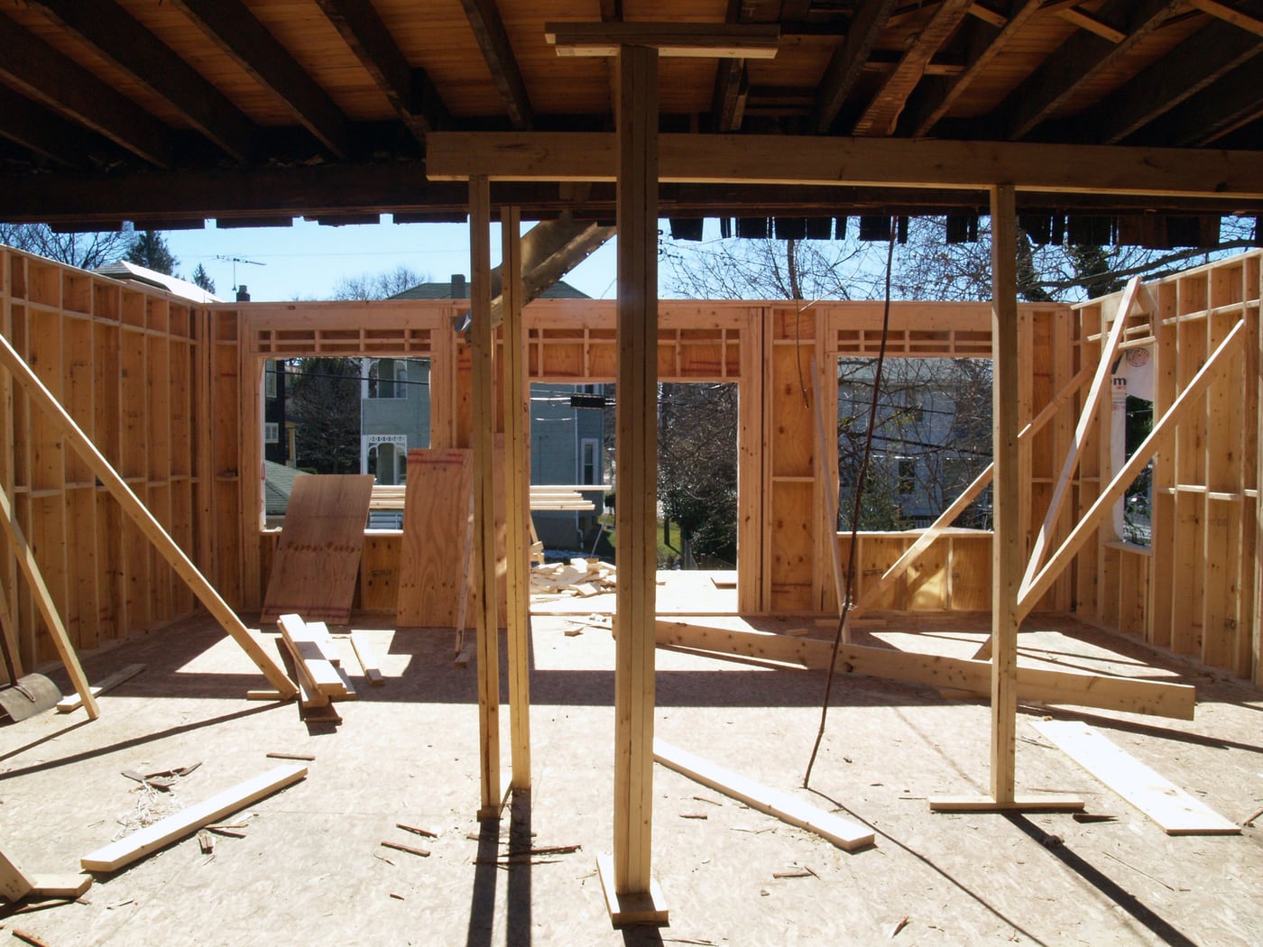 The addition framed out, opening up the back of the house for a larger kitchen